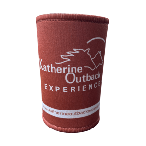 Burnt orange stubby holder in blue with the Katherine Outback Experience logo on it (the outline of 2 horses)