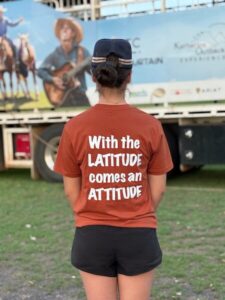 TopEndTouchTeeAdult-back Back of the Top End Tough Tshirt that reads With the Latitude comes an Attitude.